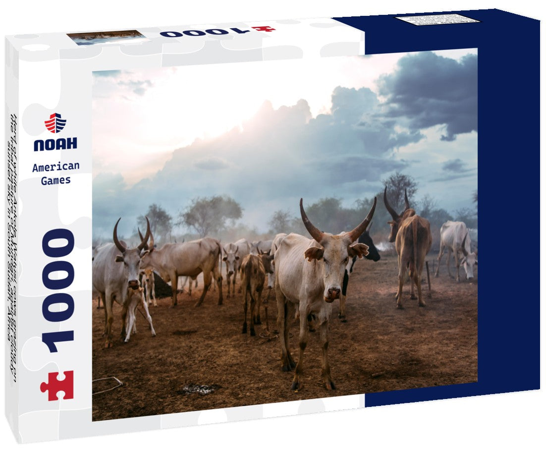 A herd of Ankole Watusi cows graze against a cloudy sunset sky in South Sudan, Africa. 1000pc PuzzleBlack and White