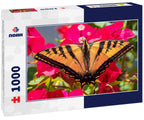 A Western Tiger Swallowtail butterfly (Papilio rutulus) feeds on the nectar of Bougainvillea flowers in Monterey, in central California 1000pc Puzzle
